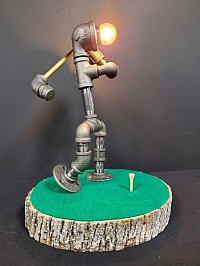 Steampunk style Golfer golf player Guy lamp made with black iron pipe, brass Plated Pipe with a tree slice base