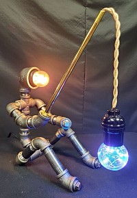 Steampunk style fisherman fishing GUY lamp made with black iron pipe, brass Plated Pipe
