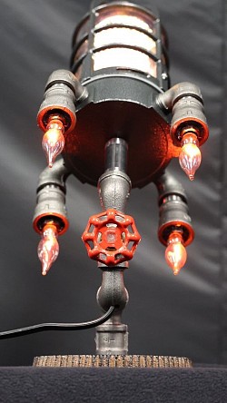 Steampunk style Rocket ship Lamp made with black iron pipe