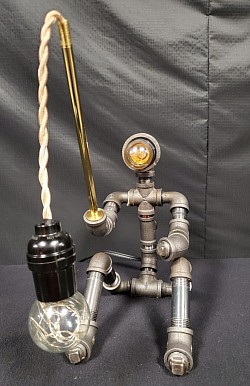Steampunk style fisherman fishing GUY lamp made with black iron pipe, brass Plated Pipe
