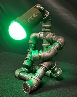 Steampunk style THINKING GUY lamp made with black iron pipe and weatherproof lamp housung